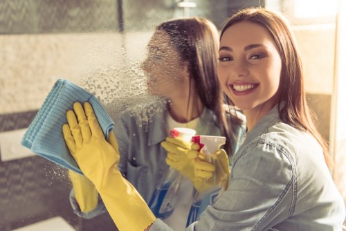 Cleaners working on hardwood floors